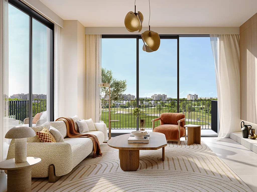 Emaar South Prices 2026: Villas, Apartments & Plans Living room interior with golf course views at Emaar South